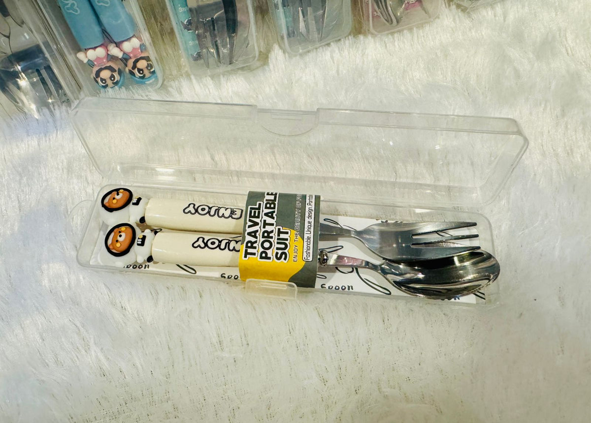 Cartoon topped travel cutlery set opened showing steel spoon and fork