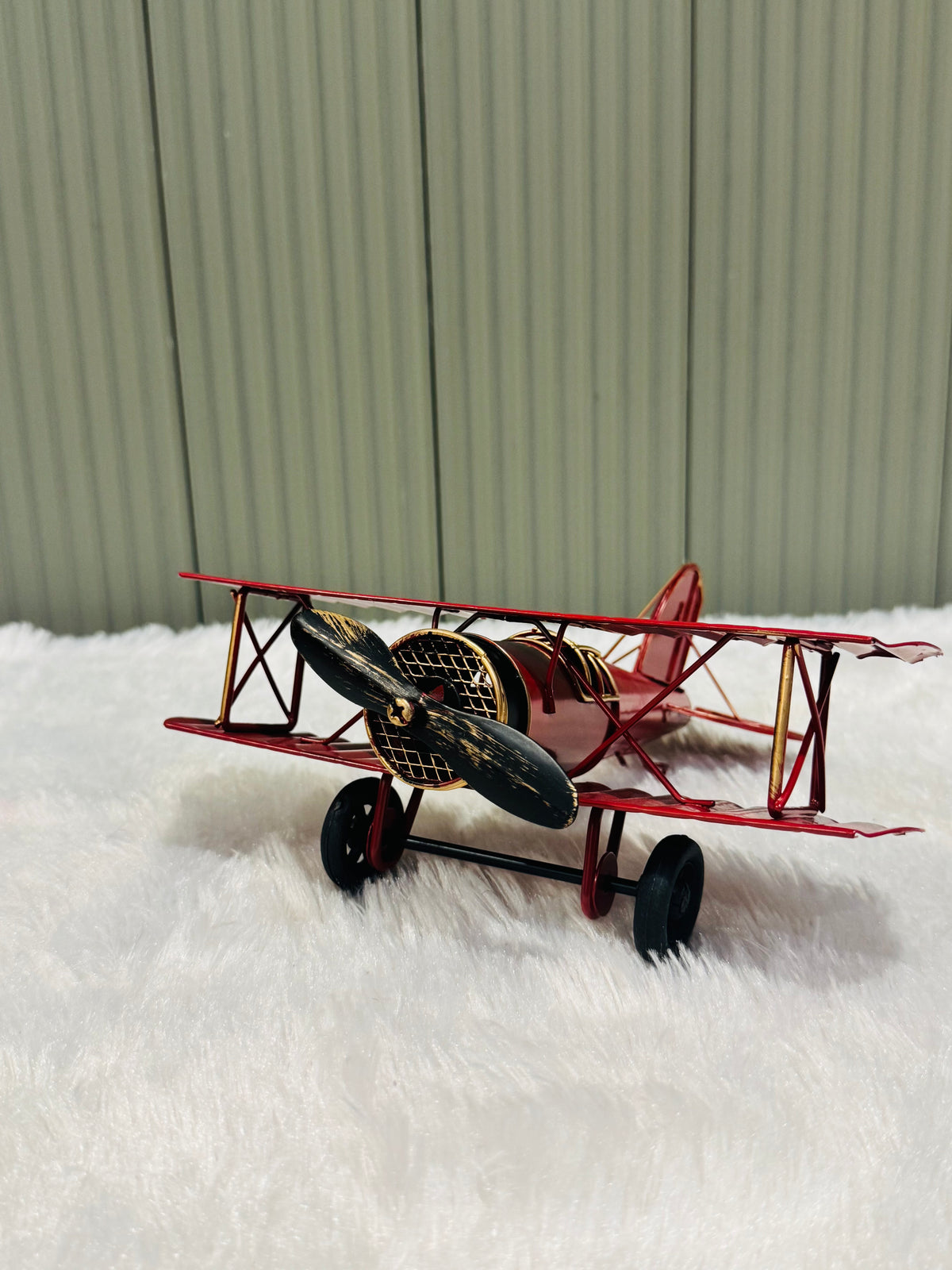 Biplane metal model on study table décor