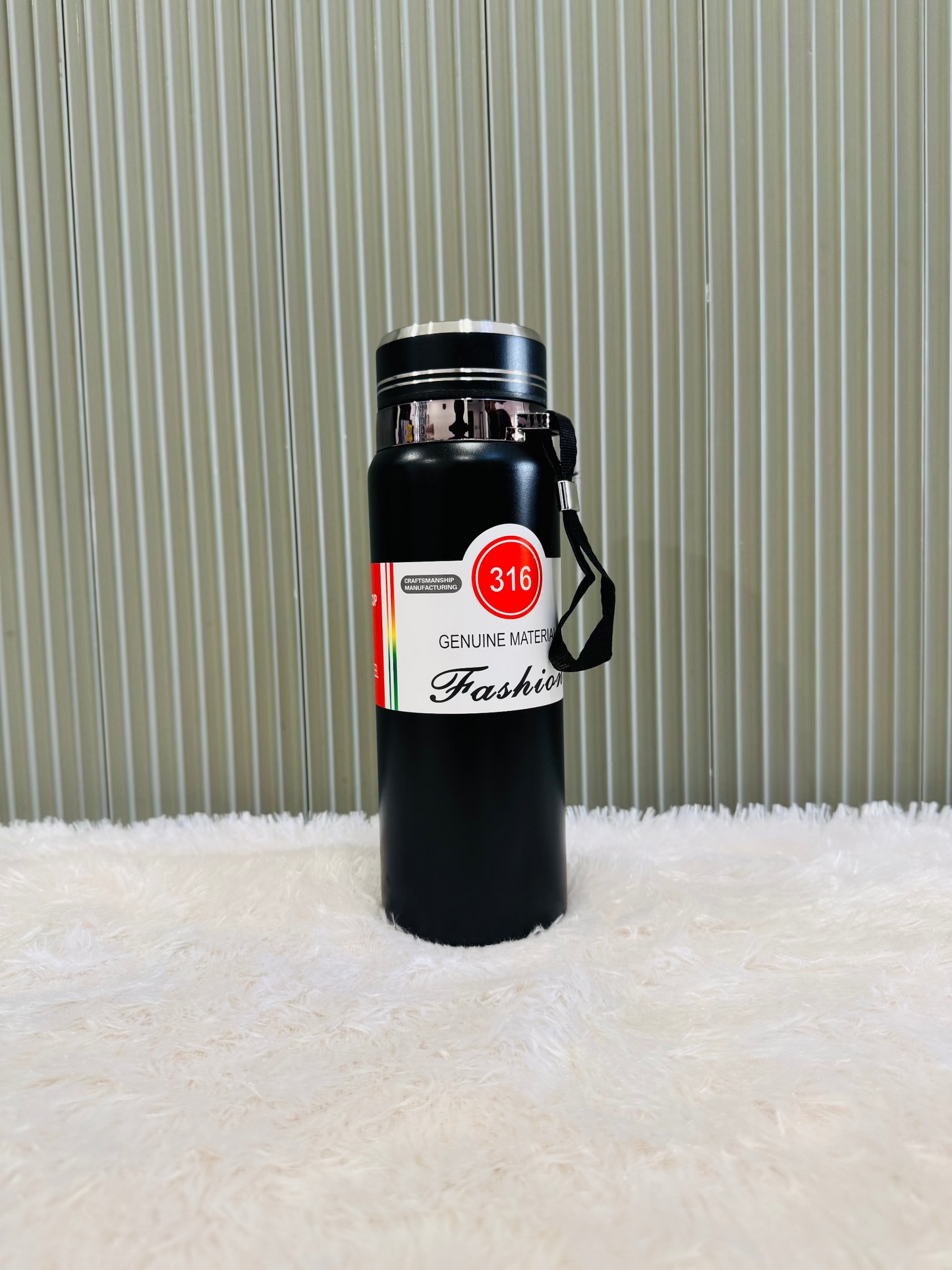 Black 800ml vacuum bottle with 316 steel label and wrist strap