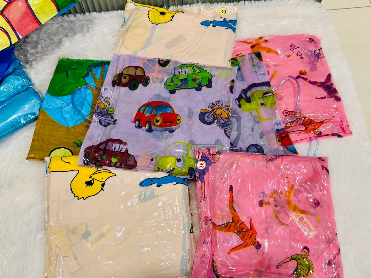 Folded cartoon print kids raincoats in cream, pink and purple
