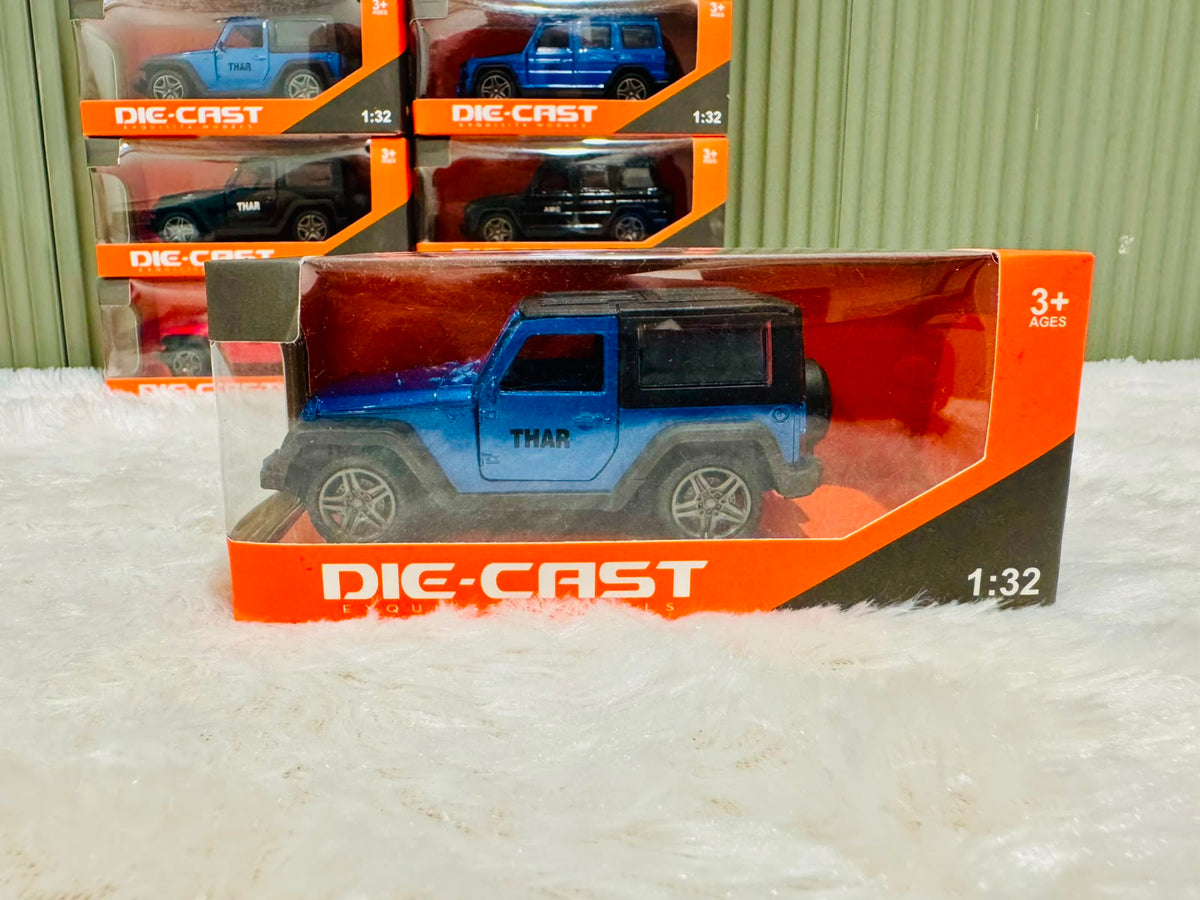 Blue boxed 1:32 die cast off road toy car with grey wheels