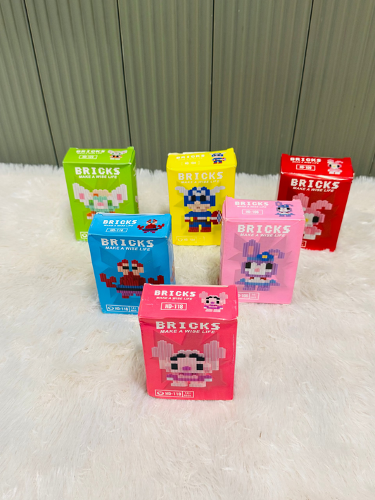 Nine small bricks block DIY toy boxes standing at angles on a rug