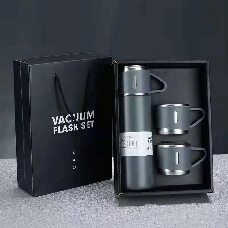 Grey vacuum flask gift set with two cups, box and carrier bag