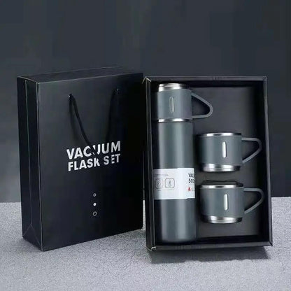 Grey vacuum flask gift set with two cups, box and carrier bag