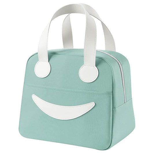 Green smiley face insulated lunch bag with front pocket and white handles