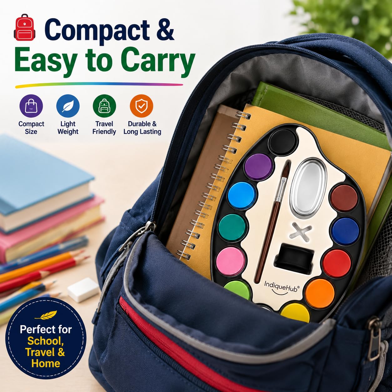 Large watercolour palette tucked into a backpack with books and pencils