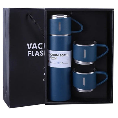 Navy vacuum flask gift set with two cups in an open black box