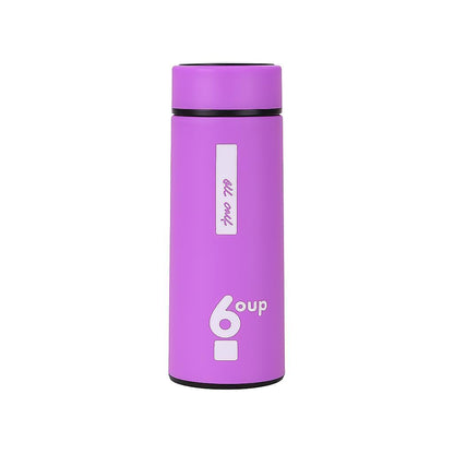 Purple 6oup glass water bottle with silicone sleeve on white