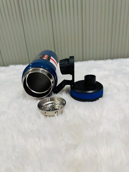 Open navy 800ml bottle showing double wall steel interior and strainer