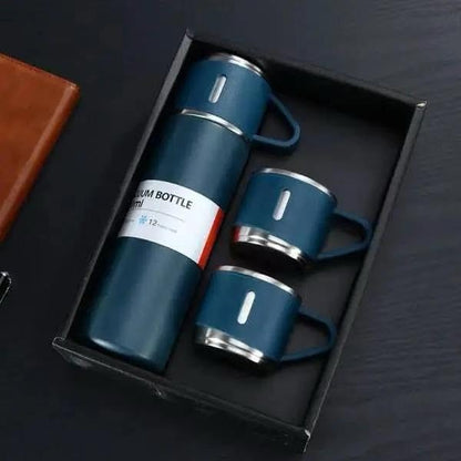 Navy vacuum flask and two cups presented in a black gift box