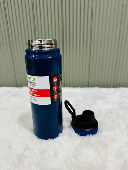 Navy 800ml bottle standing beside its removed black screw lid
