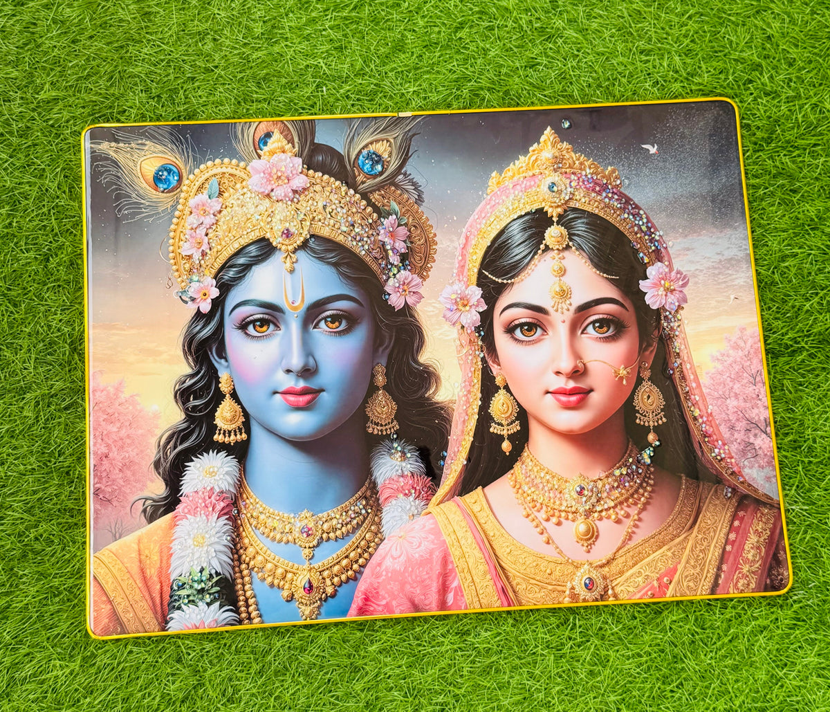 Close up of crystal embedded Radha Krishna faces with jewelled crowns