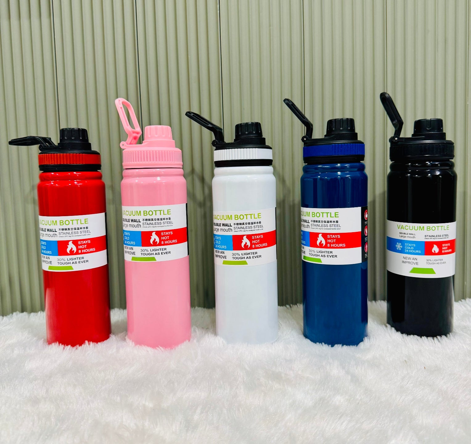 Red, pink, white, blue and black 800ml vacuum bottles lined up