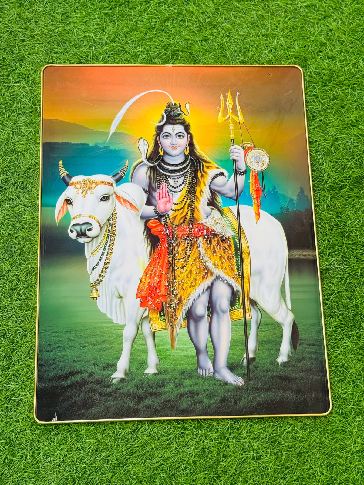Large crystal embedded Shiva on Nandi bull wall painting on grass