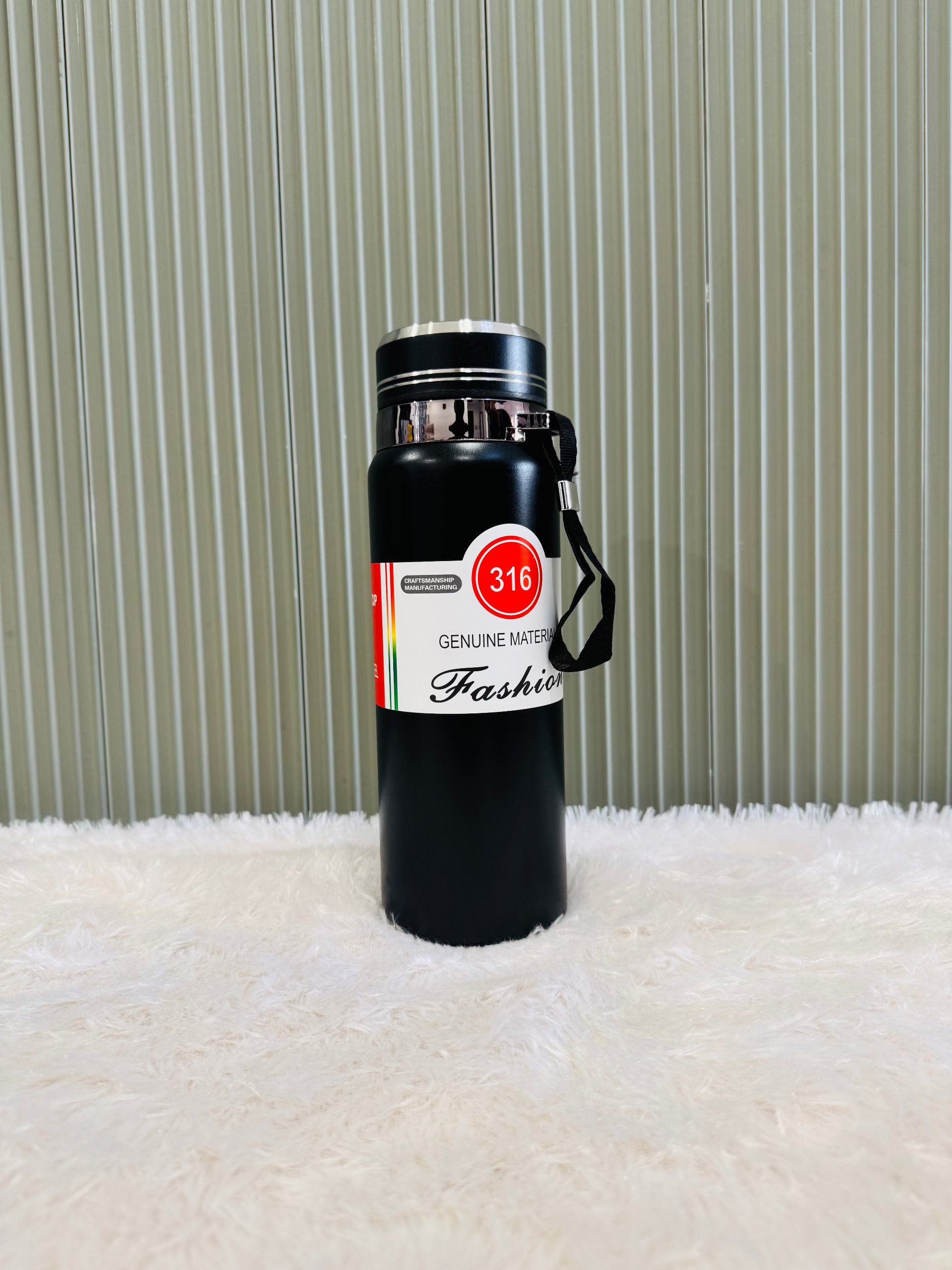 Black 800ml vacuum bottle with 316 steel label and wrist strap