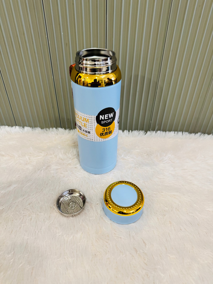 Pale blue 800ml flask beside its cup lid and steel strainer
