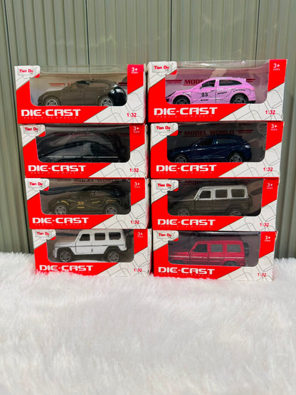 Boxed die cast toy cars in white, pink, blue, black and red