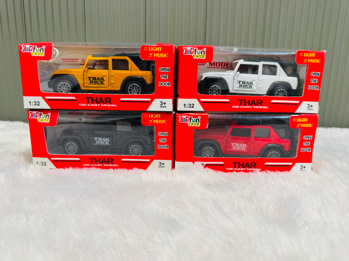 Four boxed 1:32 die cast toy cars with light and music labels