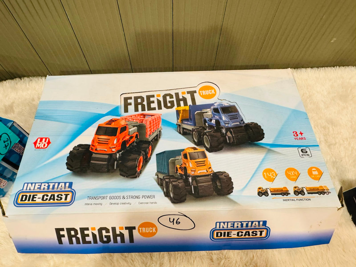 Freight truck toy box showing die cast container trucks with big wheels