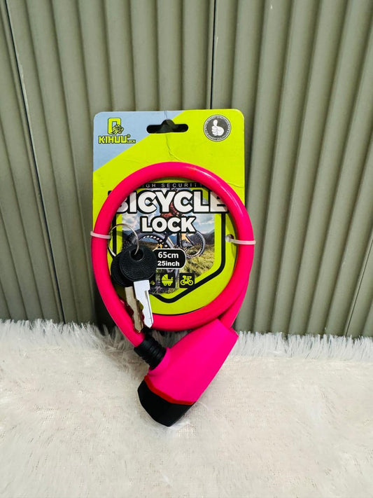 Pink 65cm bicycle cable lock with two keys on its backing card