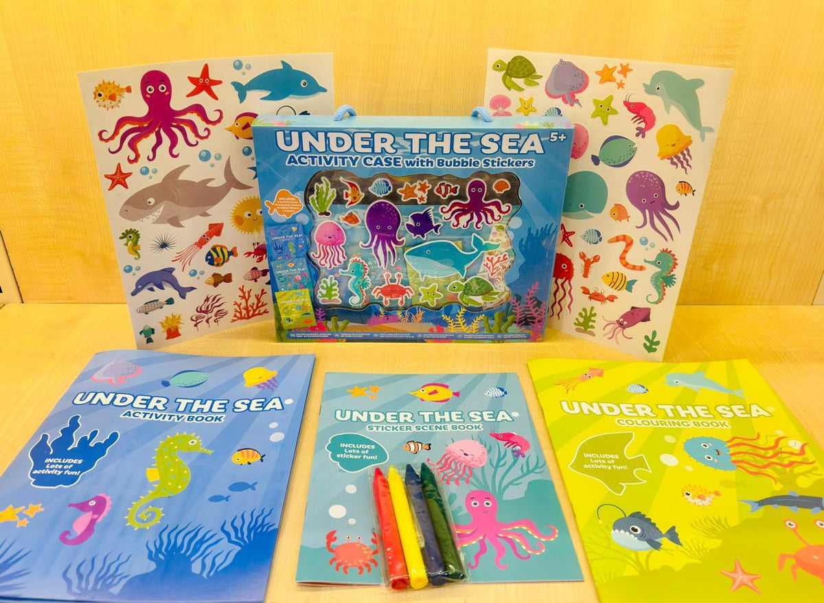 Activity case opened showing sticker sheets, colouring books and crayons