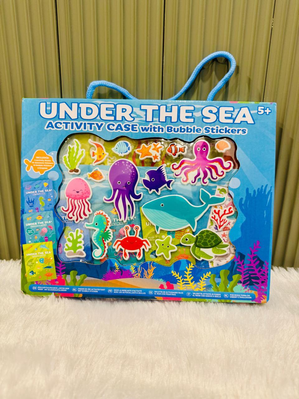 Under the Sea activity case showing sea creature pieces and rope handle