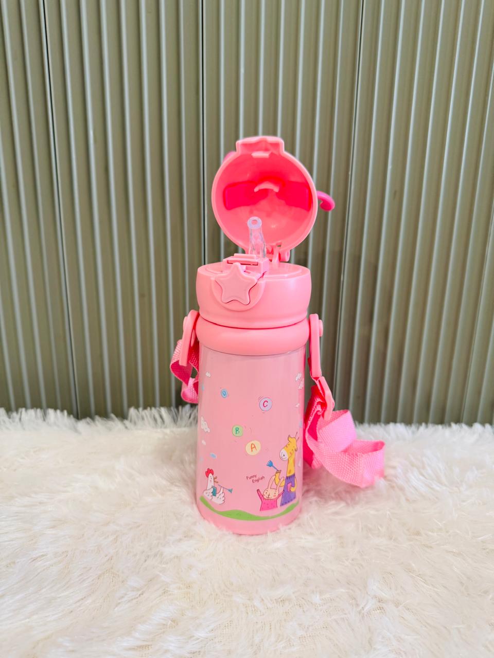 Pink reindeer bottle with giraffe print and flip straw lid open