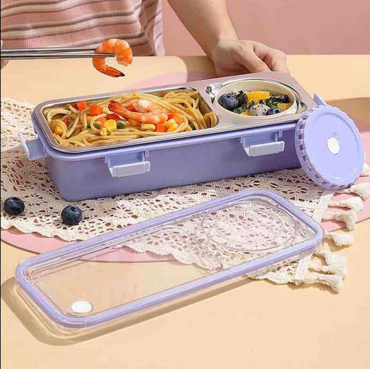 Purple two grid lunch box filled with noodles, prawns and blueberries
