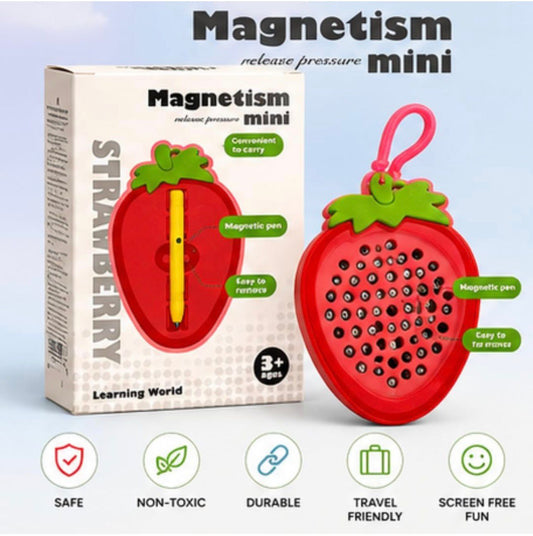 Strawberry magnetic drawing board beside its printed retail box