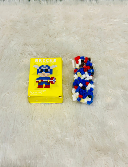 Yellow bricks block box beside an assembled blue and red block figure