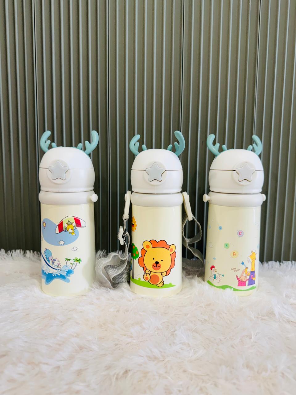 Three cream reindeer antler 500ml bottles with animal prints and straps