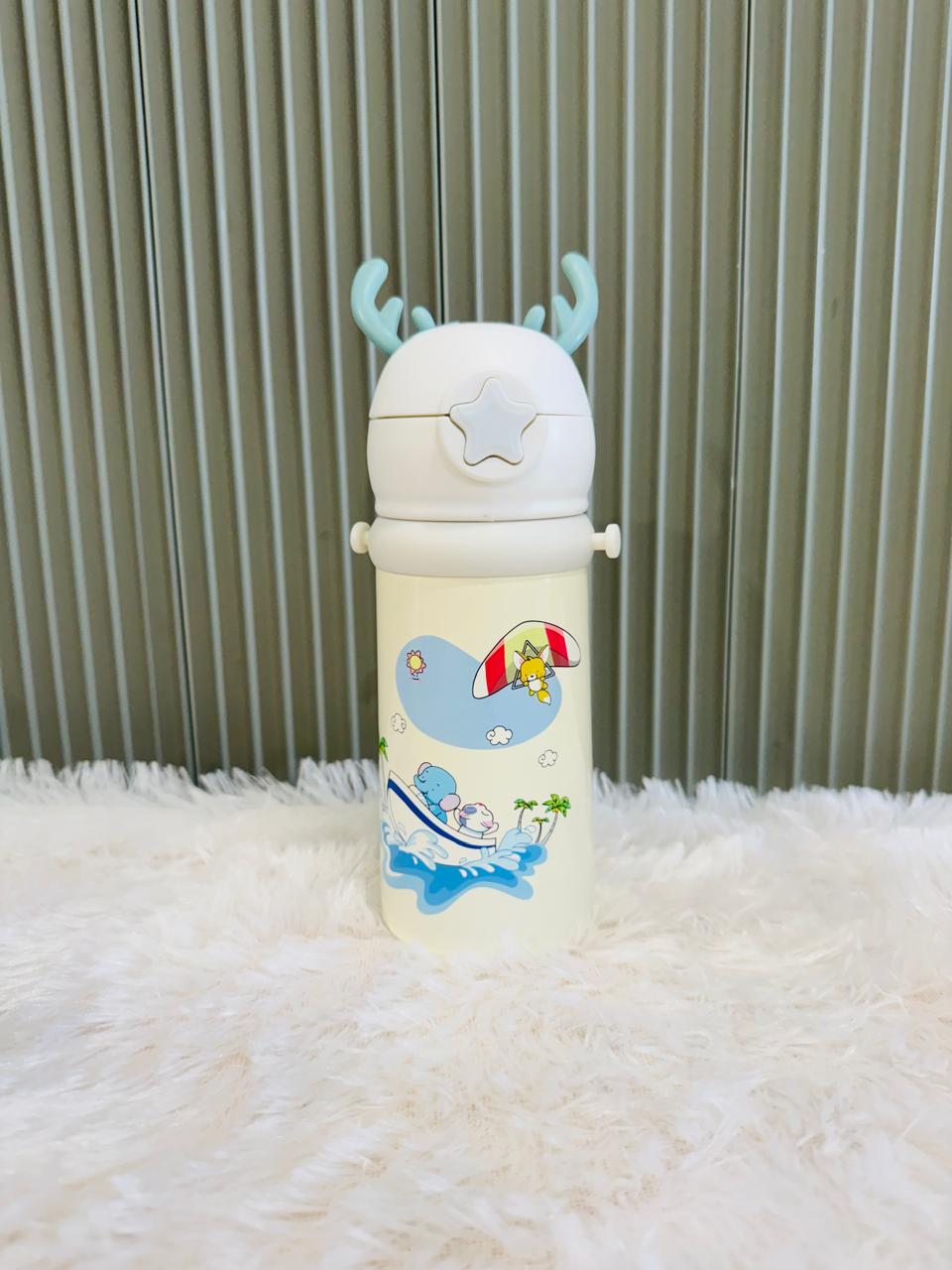 Cream reindeer antler 500ml bottle with whale print, front view